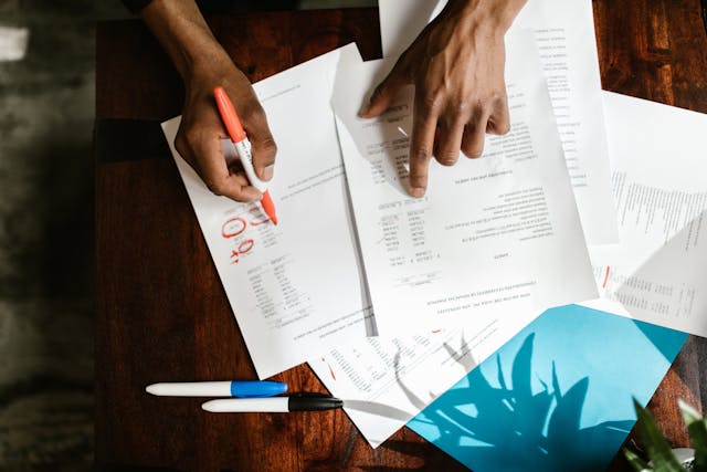 pexels-rdne-7821540 person-going-through-paperwork